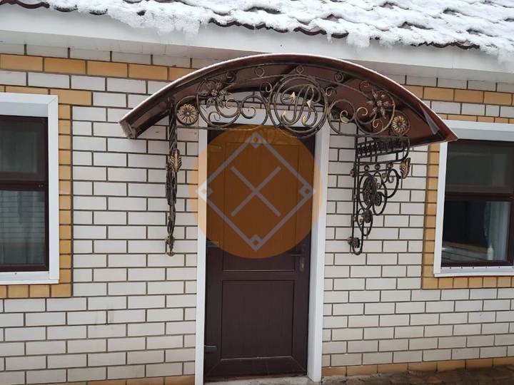 металлический козырек из профилированного поликарбоната
